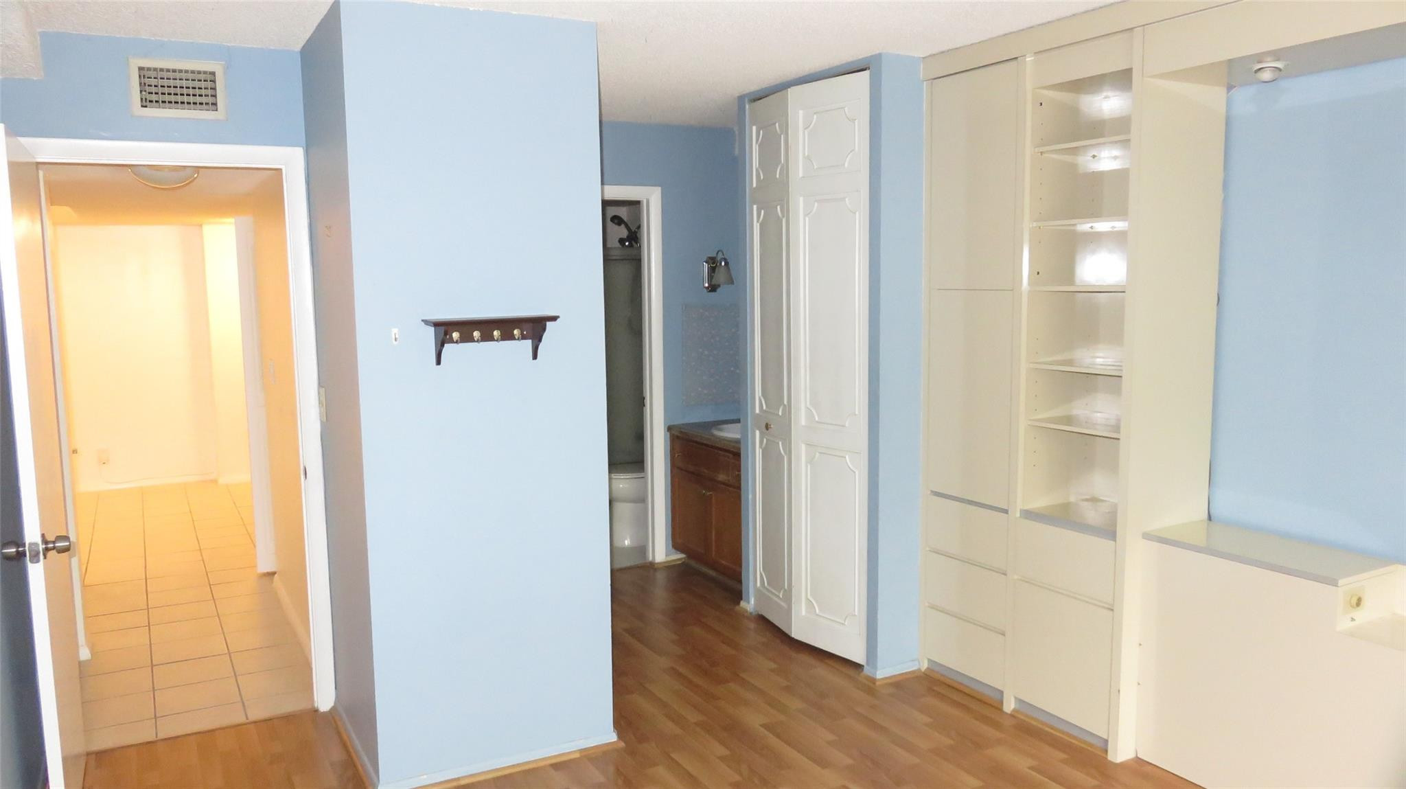 3720 Inverrary Drive, Unit 2C Lauderhill, FL 33319 - Photo 20 of 42 a view of a bathroom from a hallway