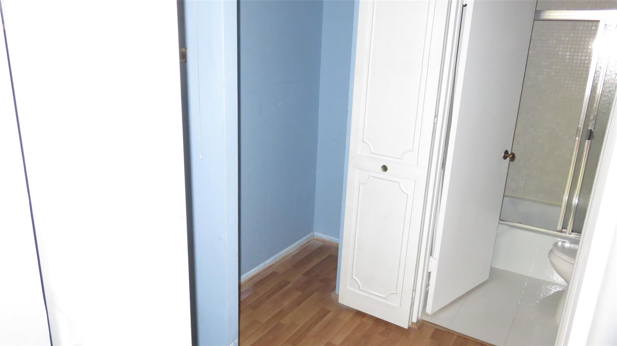 3720 Inverrary Drive, Unit 2C Lauderhill, FL 33319 - Photo 23 of 42 a view of a hallway with wooden floor