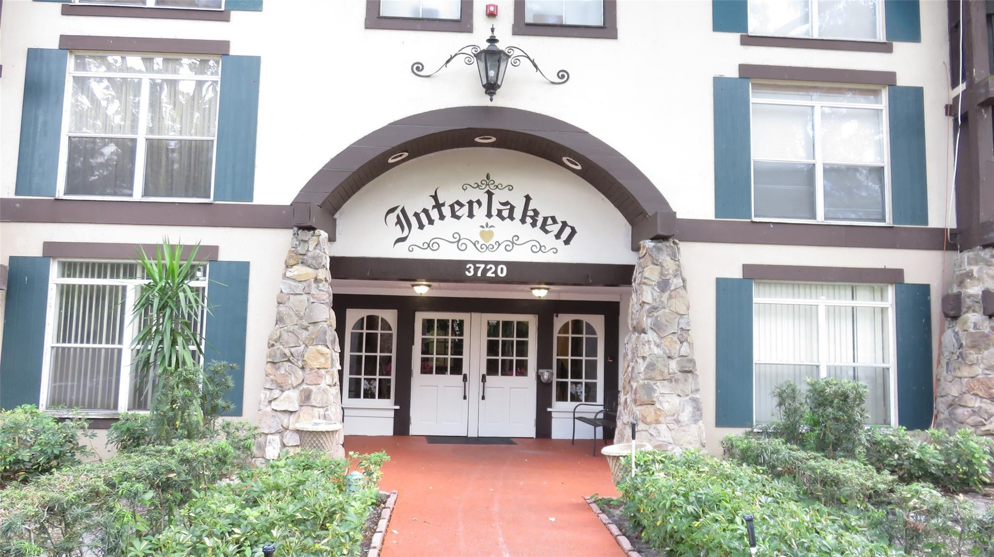 3720 Inverrary Drive, Unit 2C Lauderhill, FL 33319 - Photo 3 of 42 a view of entrance into the building