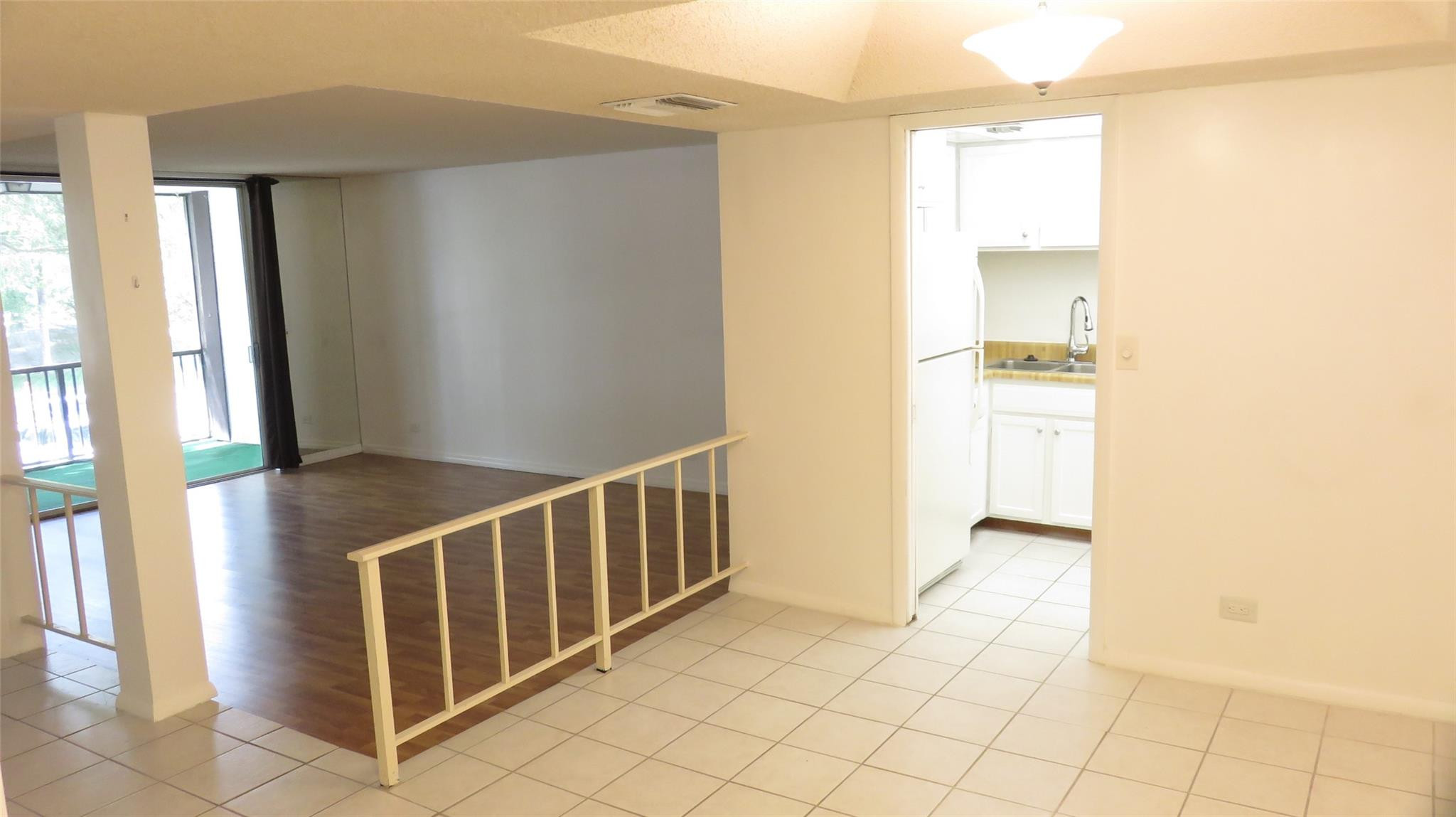 3720 Inverrary Drive, Unit 2C Lauderhill, FL 33319 - Photo 5 of 42 a view of hallway with stairs