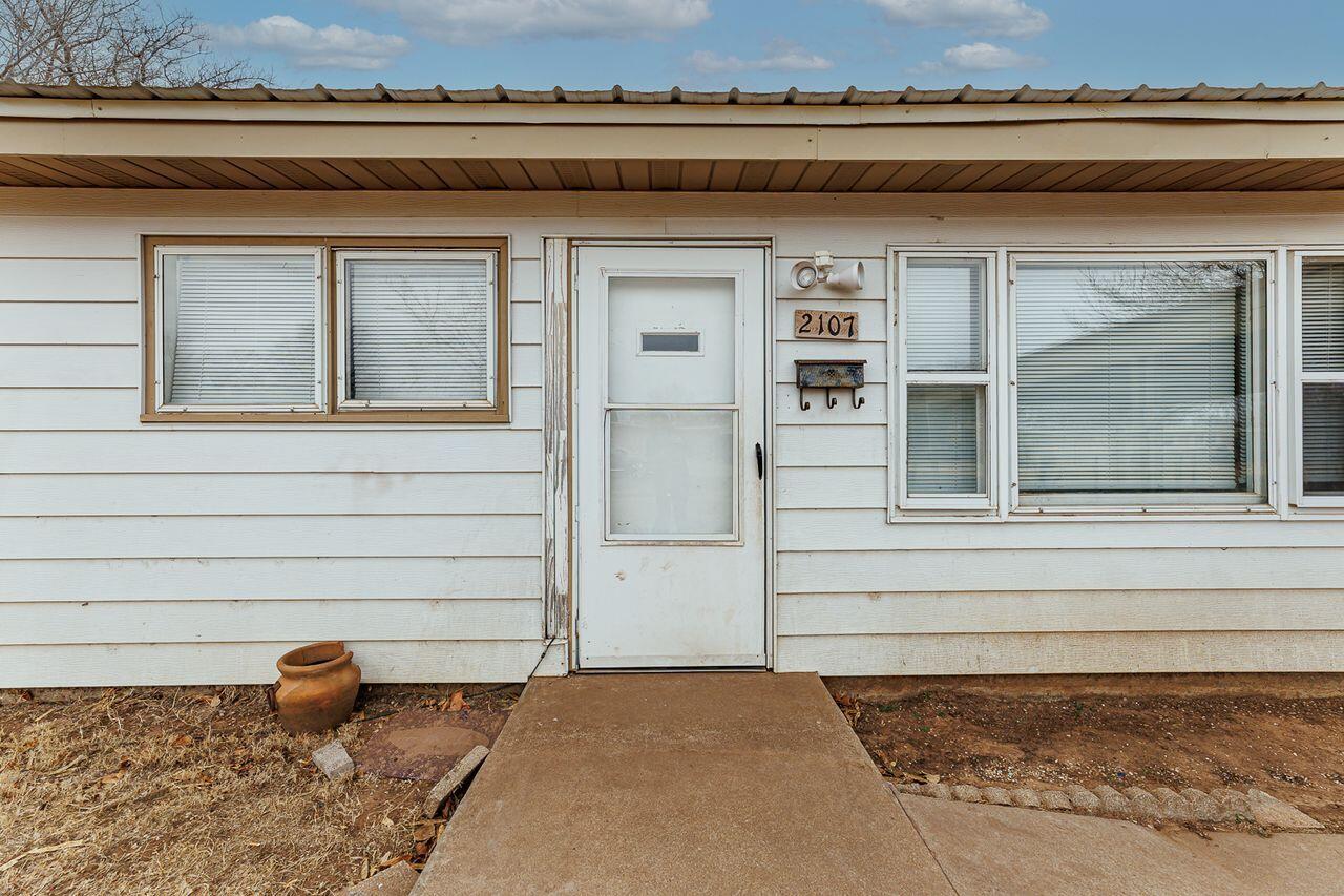 2107 48th Street Lubbock, TX 79412 - Photo 1 of 20 a view of a entryway of the house