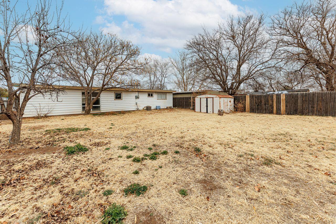 2107 48th Street Lubbock, TX 79412 - Photo 20 of 20 a view of a yard with a house