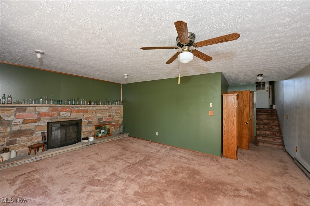 3079 Stroup Road Atwater, OH 44201 - Photo 36 of 40 Welcome to 3079 Stroup Rd, Atwater, OH 44201-9105 - Looking into the lower-level family room from the mud/laundry room.