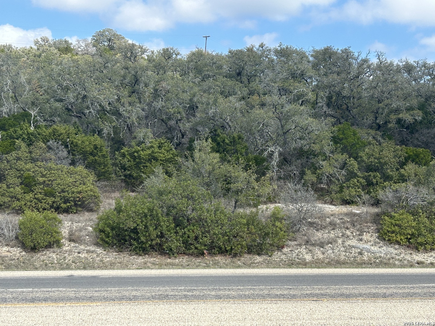 18810 Bandera Road Helotes, TX 78023 - Photo 17 of 29 an aerial view of a yard