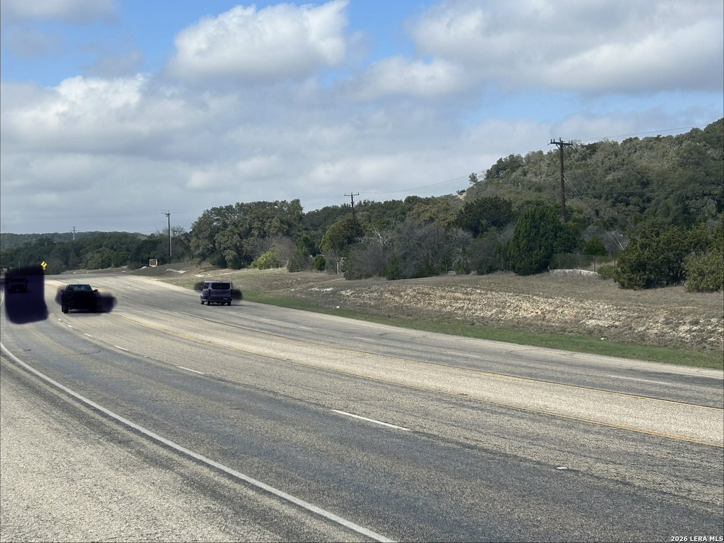 18810 Bandera Road Helotes, TX 78023 - Photo 19 of 29 a view of street with houses
