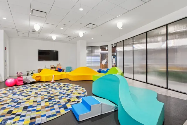 a room with furniture and a flat screen tv