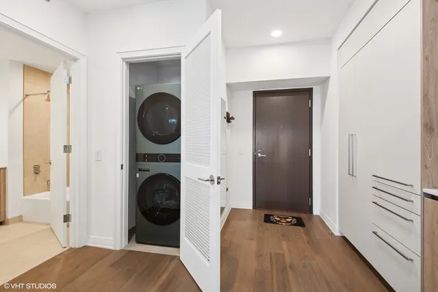 a bedroom with a bed and a mirror