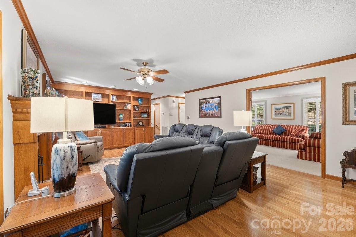 207 Lost Corner Road Morganton, NC 28655 - Photo 25 of 46 a living room with furniture a large window and flat screen tv