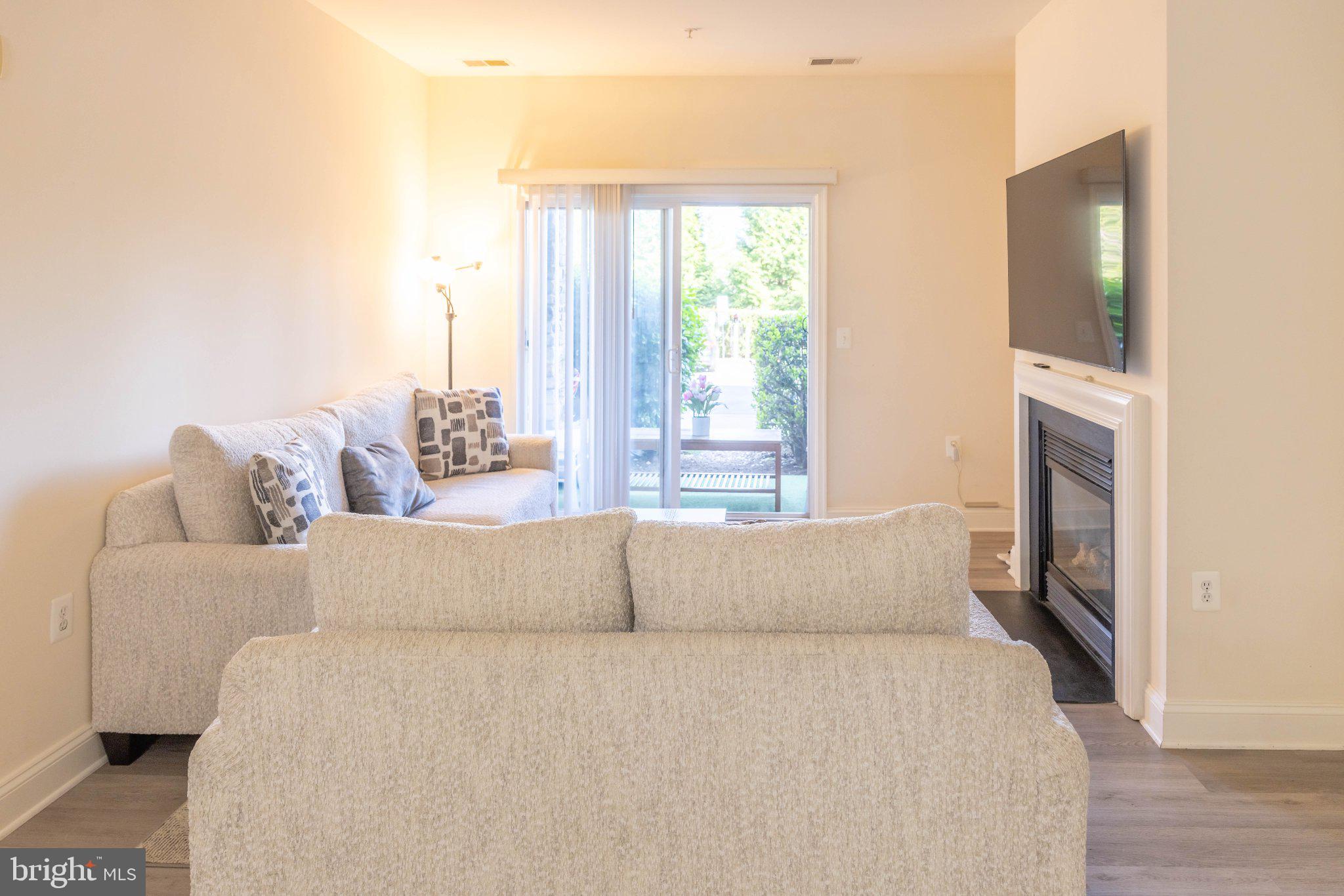 12824 Clarksburg Square Road, Unit 105 Clarksburg, MD 20871 - Photo 25 of 96 Bright and inviting living space.