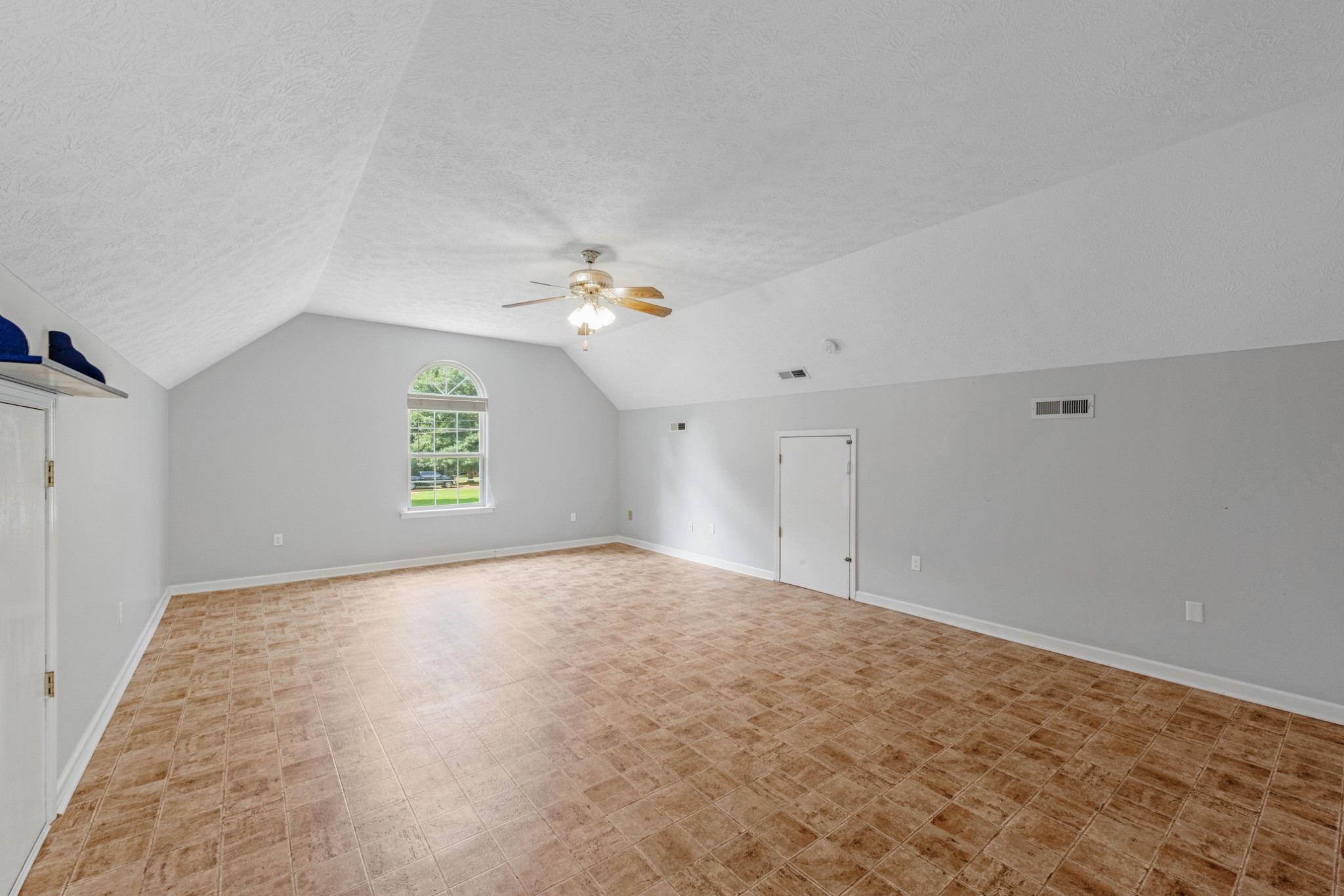 212 Independence Street Springfield, TN 37172 - Photo 11 of 26 a view of an empty room with a window