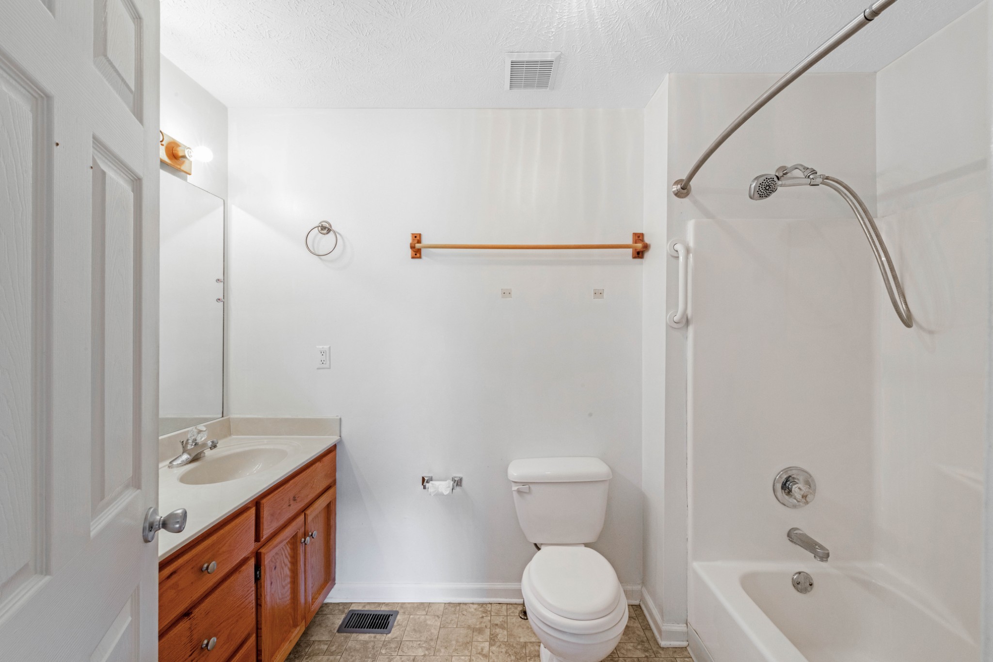 212 Independence Street Springfield, TN 37172 - Photo 13 of 26 a bathroom with a sink a toilet and shower