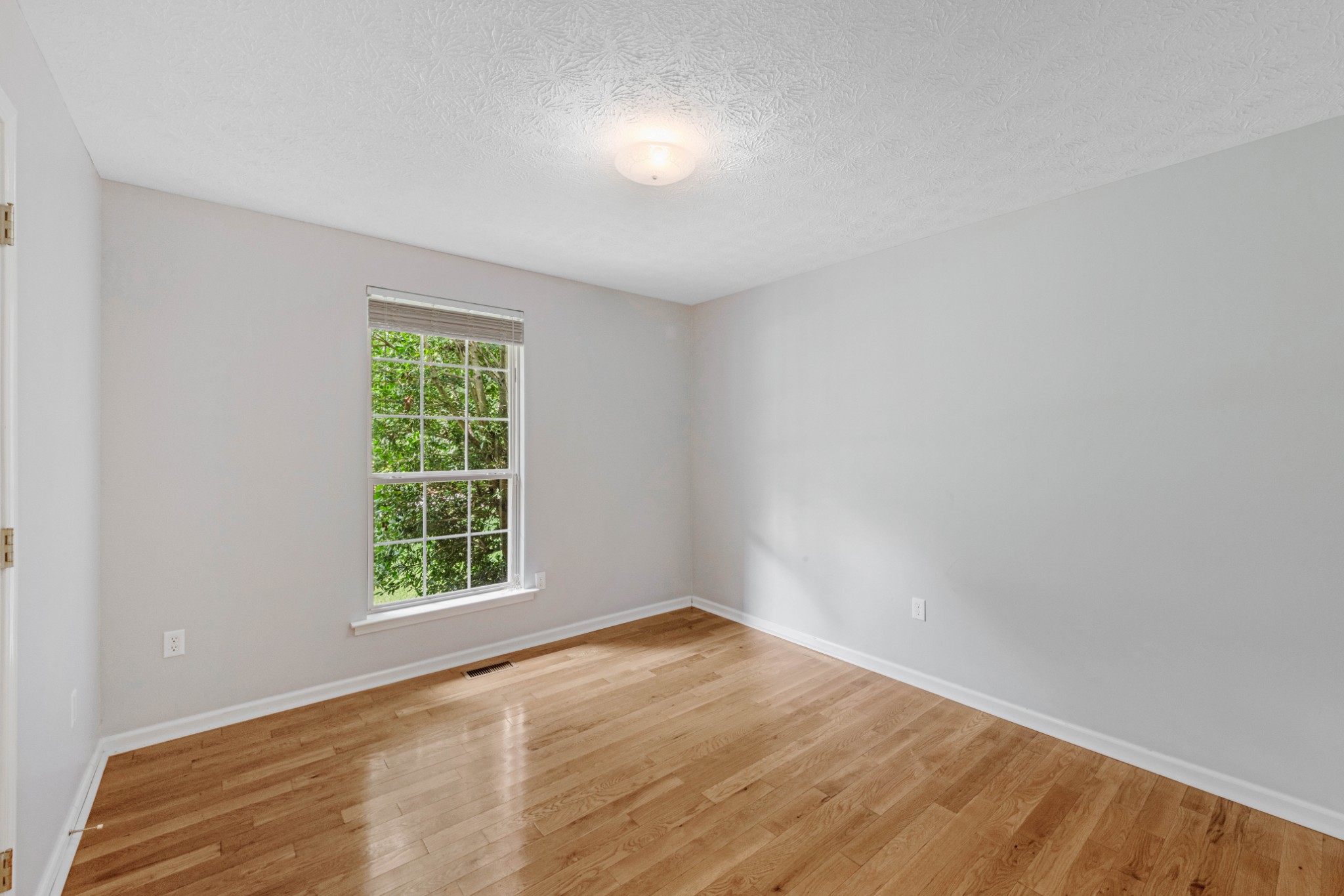 212 Independence Street Springfield, TN 37172 - Photo 14 of 26 an empty room with a window