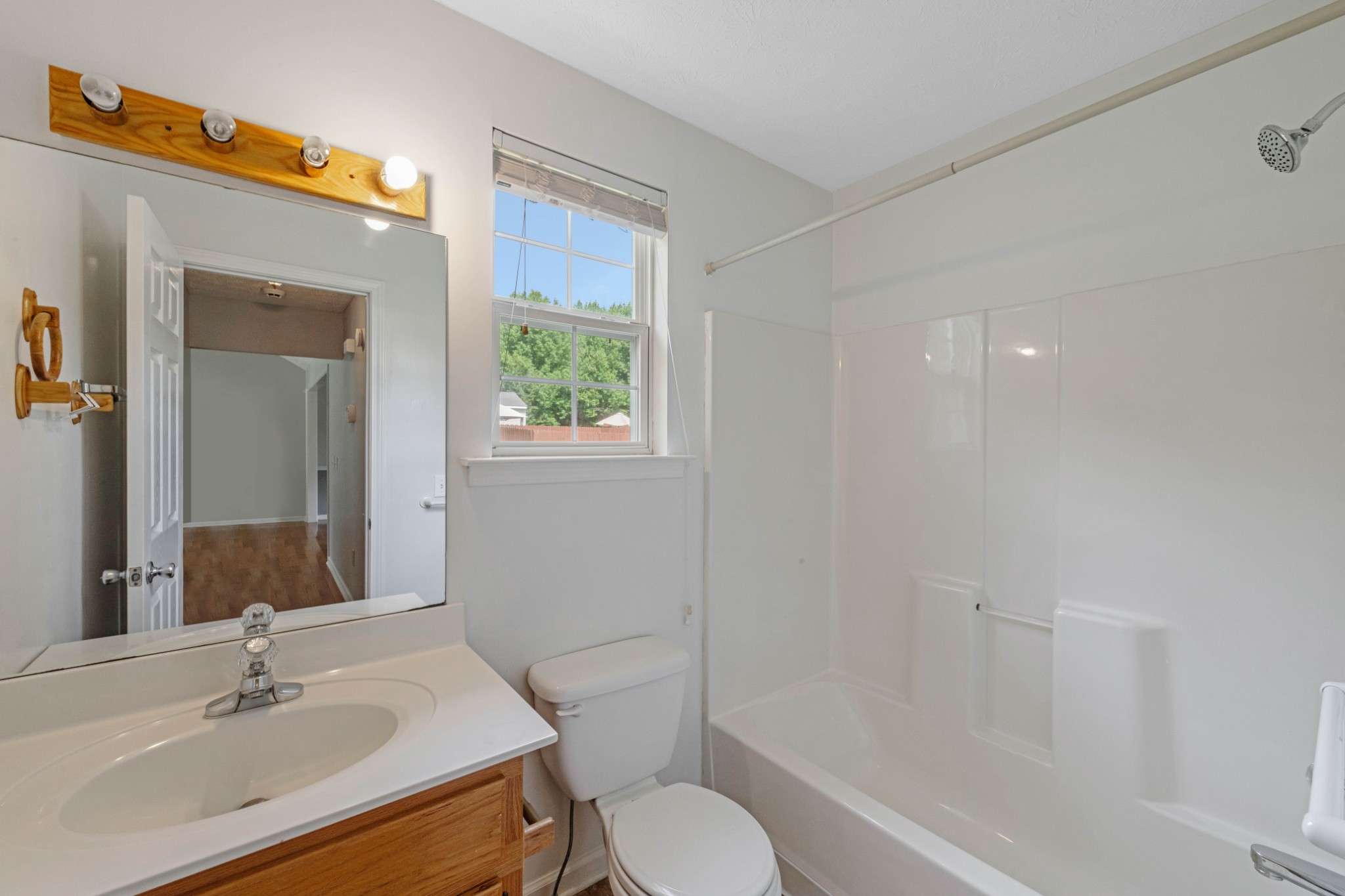 212 Independence Street Springfield, TN 37172 - Photo 15 of 26 a bathroom with a sink toilet and shower