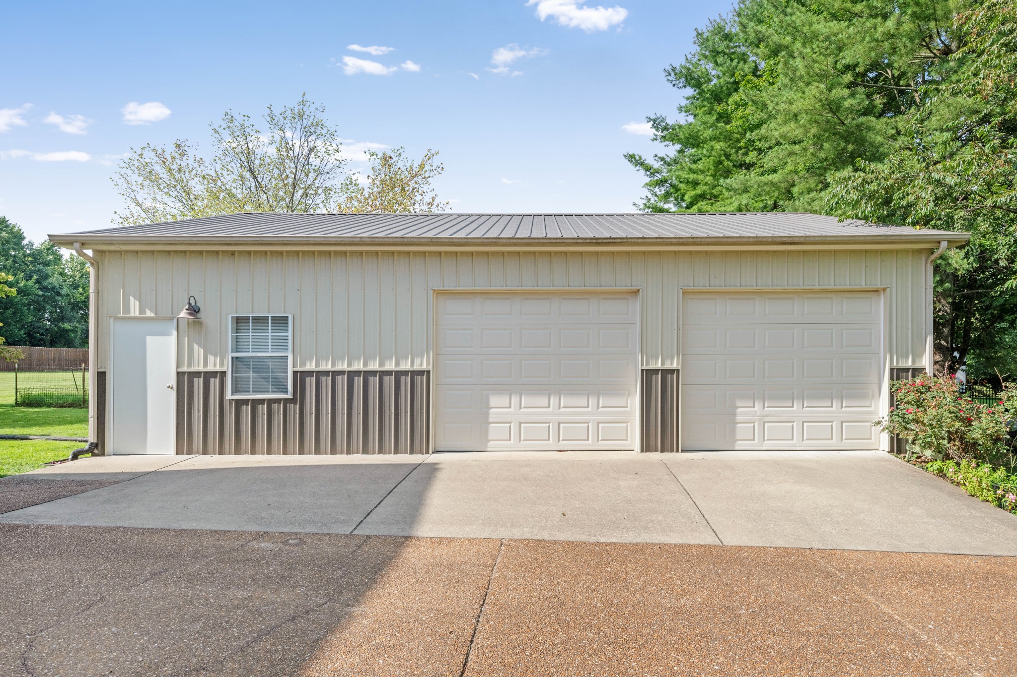 212 Independence Street Springfield, TN 37172 - Photo 17 of 26 a front view of a house with a garage