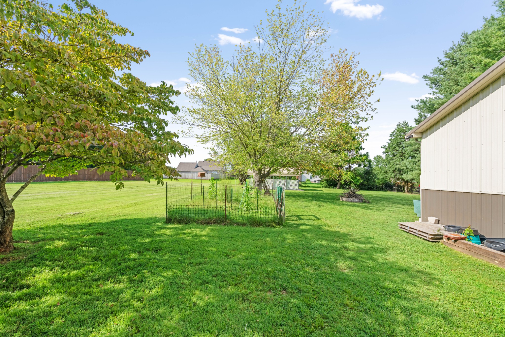 212 Independence Street Springfield, TN 37172 - Photo 21 of 26 a view of a backyard with a small cabin