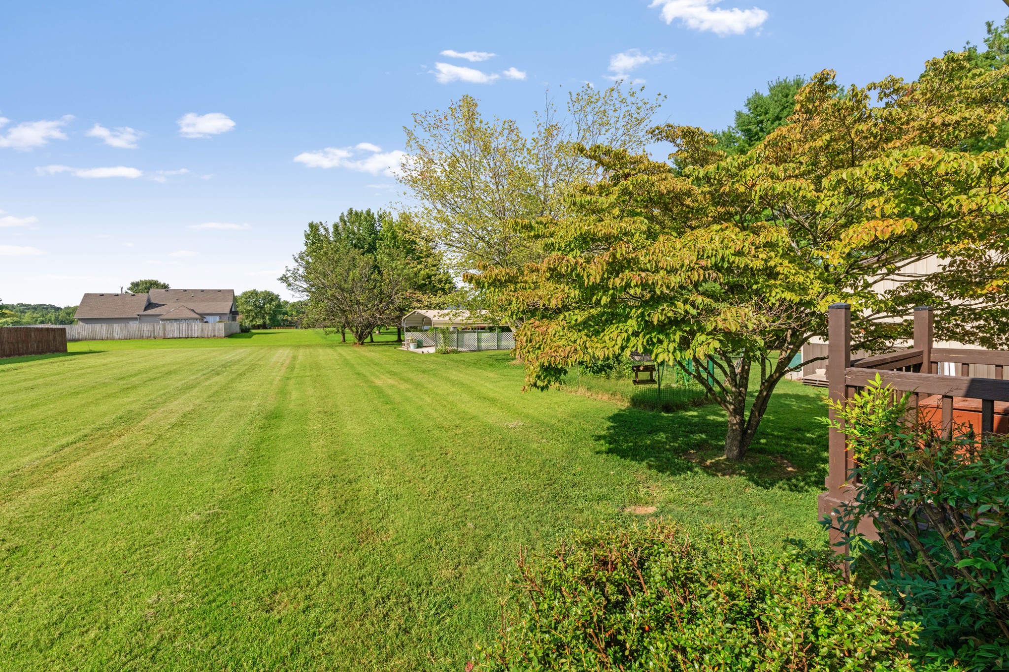 212 Independence Street Springfield, TN 37172 - Photo 23 of 26 a view of a golf course with a lake