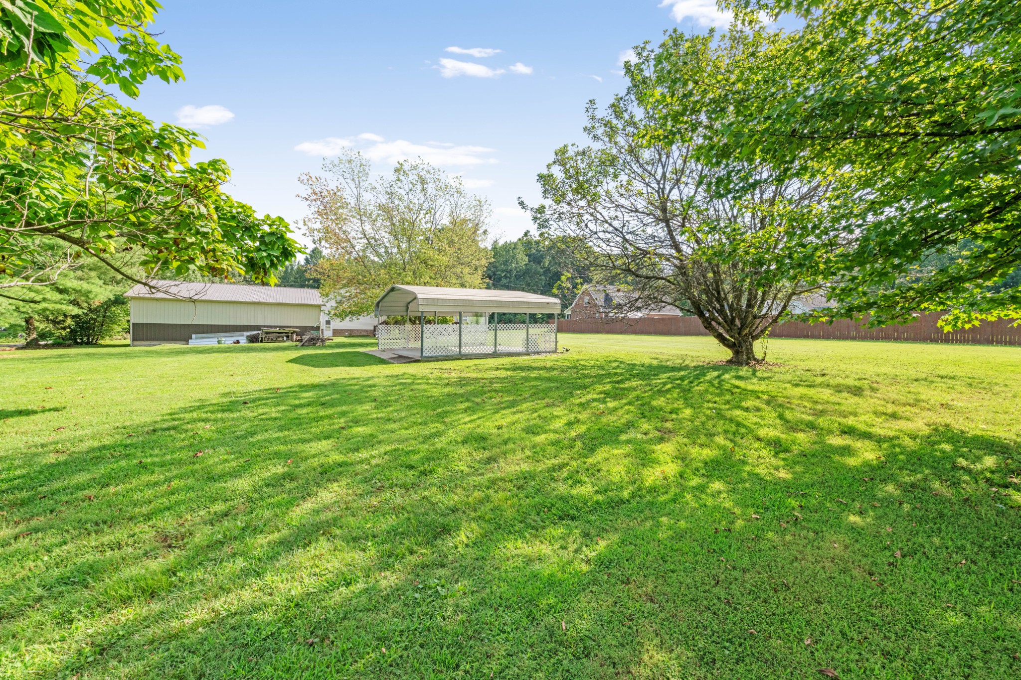 212 Independence Street Springfield, TN 37172 - Photo 25 of 26 a view of an house with backyard space and garden