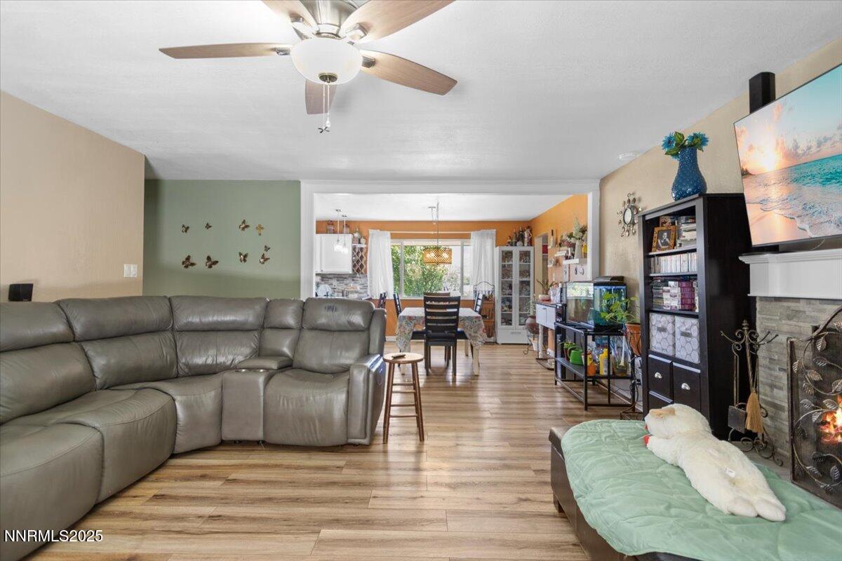 160 Cheyenne Drive Reno, NV 89521 - Photo 13 of 32 a living room with furniture and a wooden floor