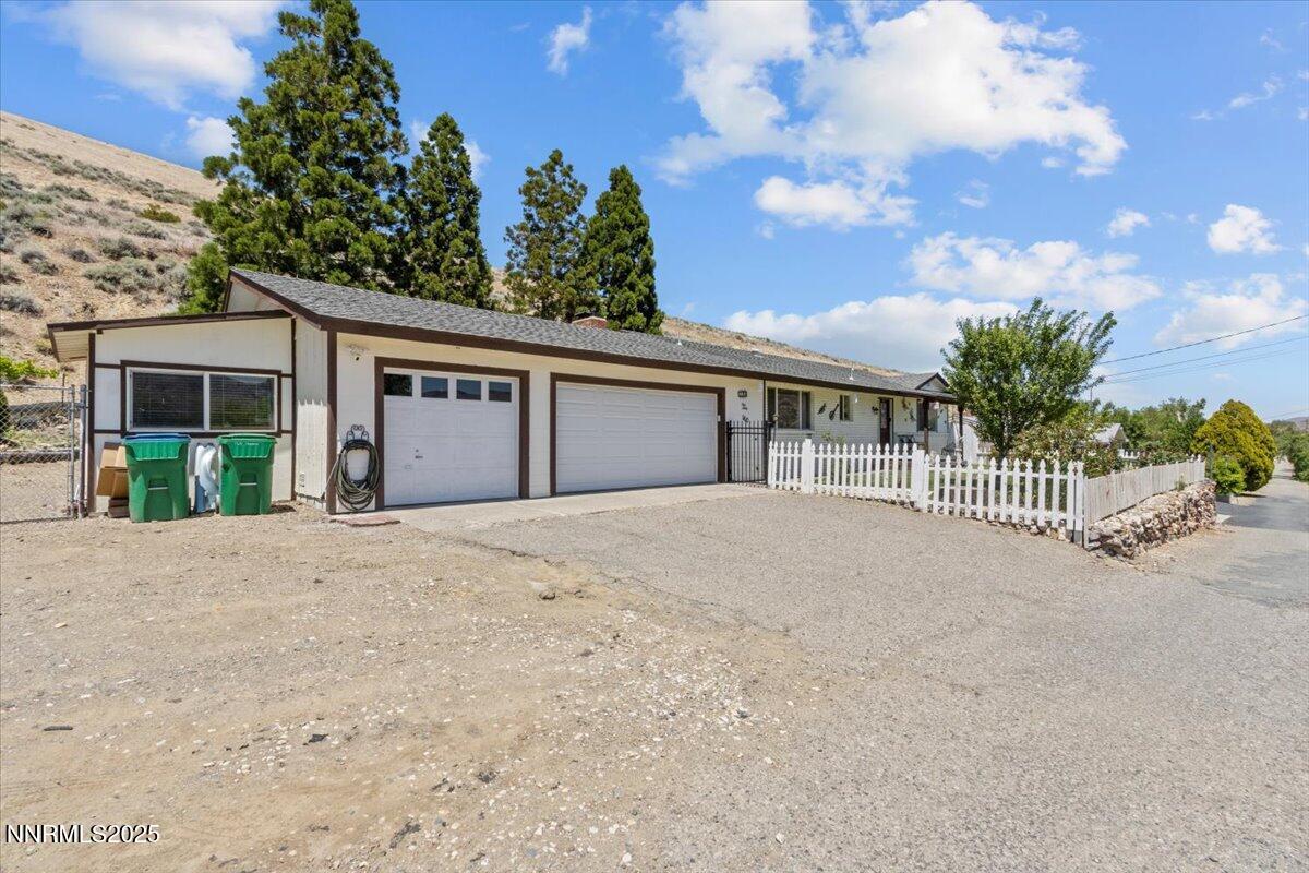 160 Cheyenne Drive Reno, NV 89521 - Photo 27 of 32 front view of a house with a yard