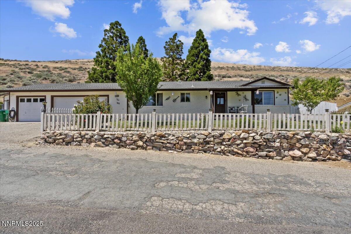 160 Cheyenne Drive Reno, NV 89521 - Photo 28 of 32 a front view of a house having yard