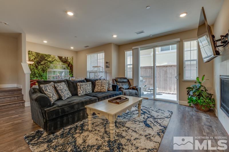 2024 Wind Ranch Road, Unit B Reno, NV 89521 - Photo 3 of 18 a living room with furniture and a large window