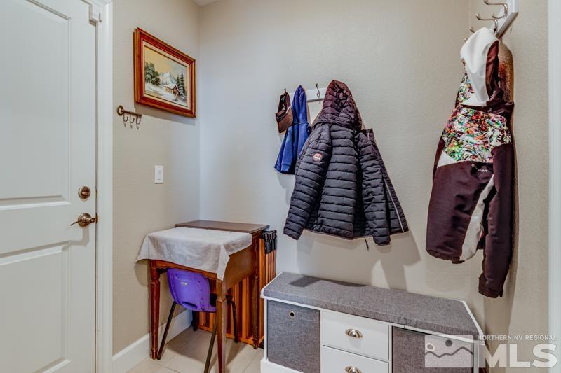 2024 Wind Ranch Road, Unit B Reno, NV 89521 - Photo 9 of 18 a view of walk in closet with clothes and shoes
