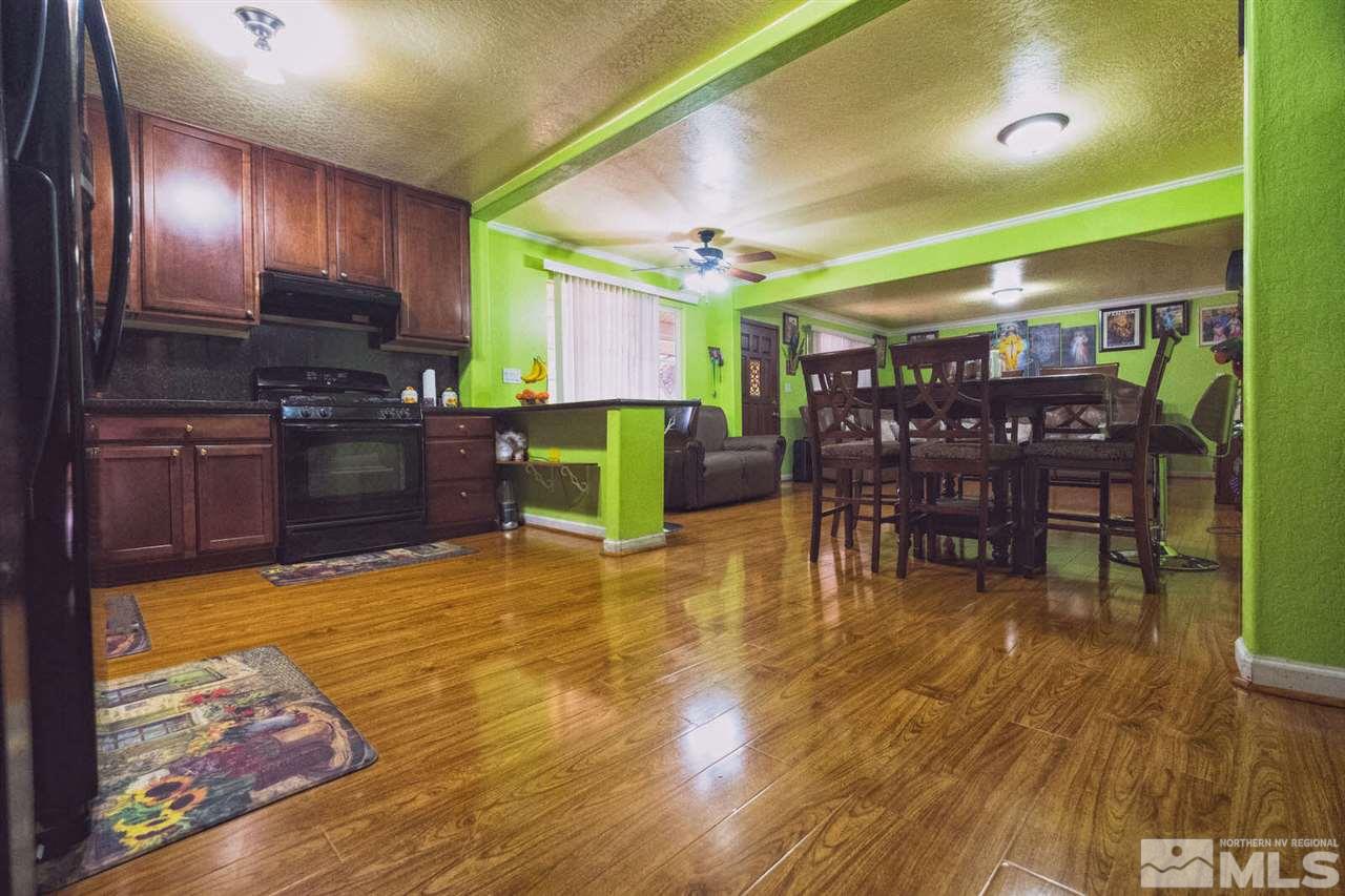 2375 Trident Way Reno, NV 89512 - Photo 8 of 25 a view of a kitchen with dining room