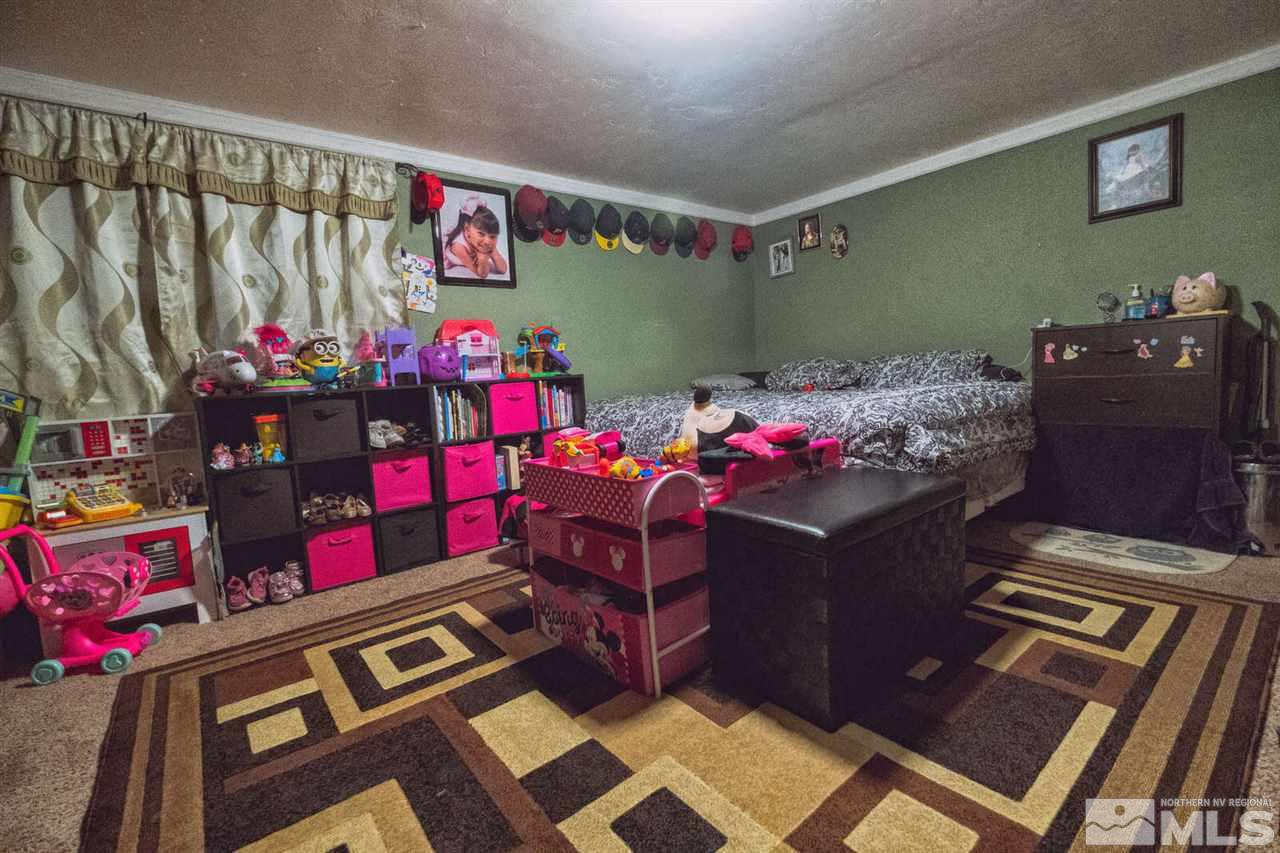 2375 Trident Way Reno, NV 89512 - Photo 10 of 25 a room with lots of different colored cloths