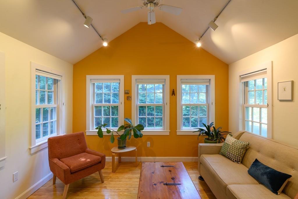 3 Walpole Road Williamsburg, MA 01039 - Photo 10 of 20 a living room with furniture and large windows