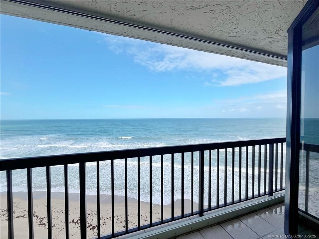 9500 South Ocean Drive, Unit HIGHER Jensen Beach, FL 34957 - Photo 12 of 53 a close view of deck with a yard