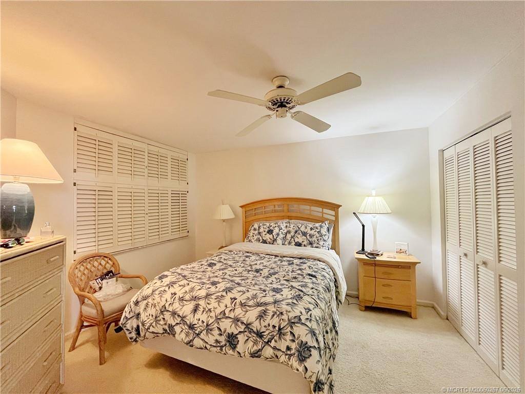 9500 South Ocean Drive, Unit HIGHER Jensen Beach, FL 34957 - Photo 20 of 53 a bedroom with a bed and a window