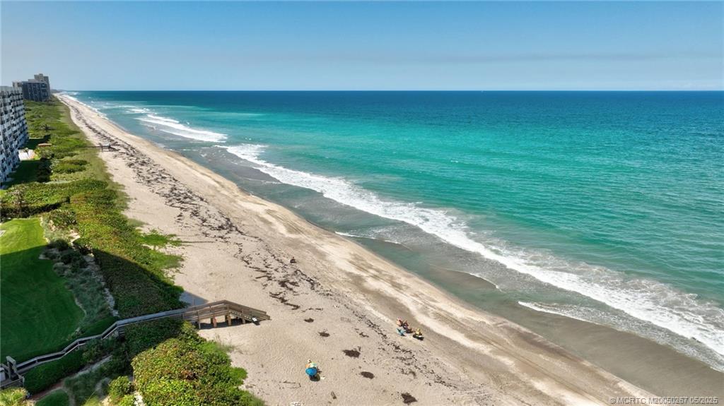 9500 South Ocean Drive, Unit HIGHER Jensen Beach, FL 34957 - Photo 27 of 53 a view of an ocean beach