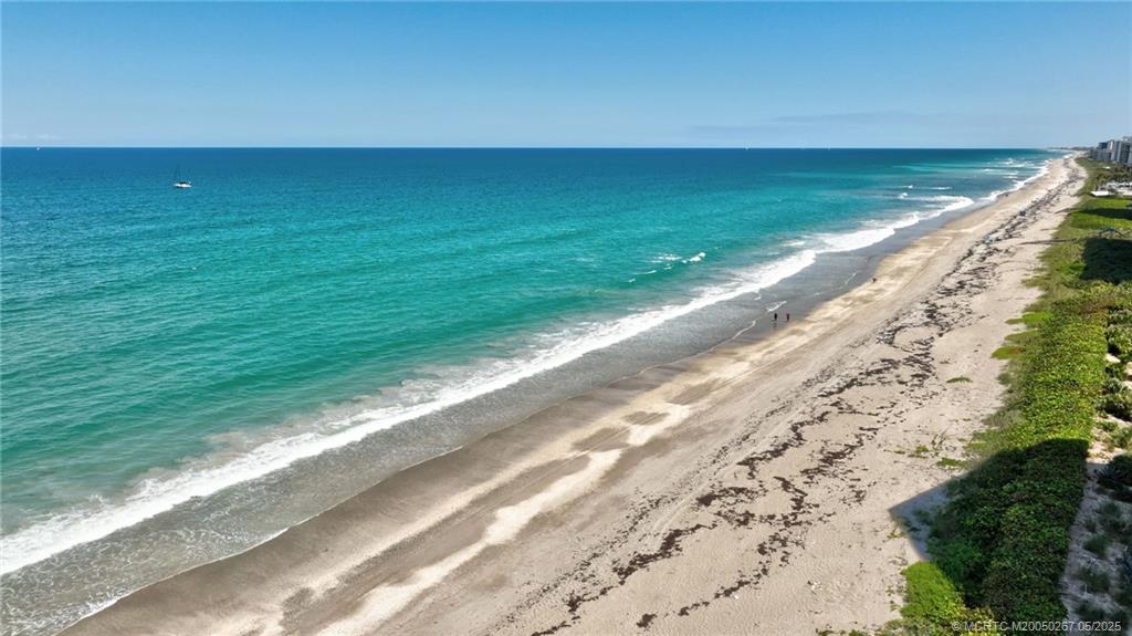 9500 South Ocean Drive, Unit HIGHER Jensen Beach, FL 34957 - Photo 28 of 53 a view of an ocean beach