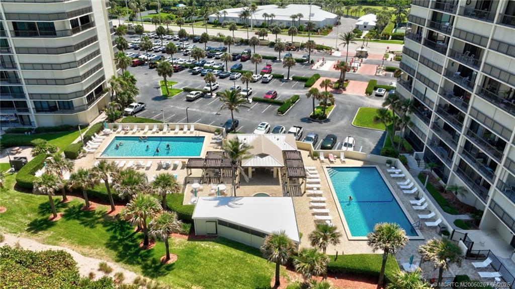 9500 South Ocean Drive, Unit HIGHER Jensen Beach, FL 34957 - Photo 31 of 53 a picture of a table and chairs