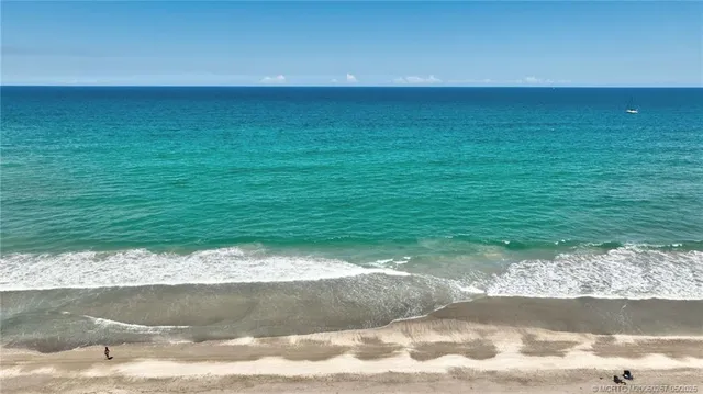a view of swimming pool from a yard