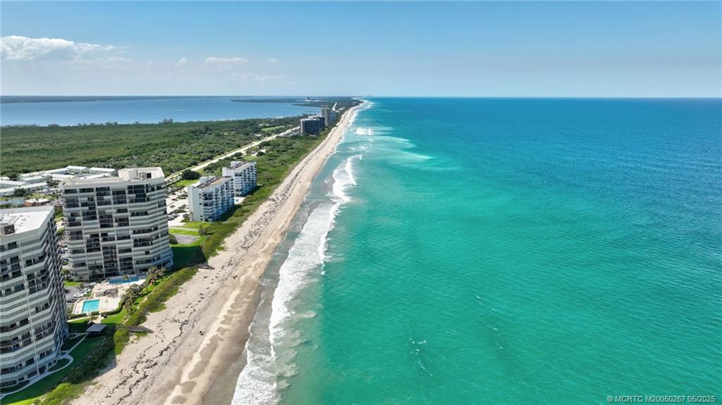 9500 South Ocean Drive, Unit HIGHER Jensen Beach, FL 34957 - Photo 36 of 53 a view of a city with an ocean
