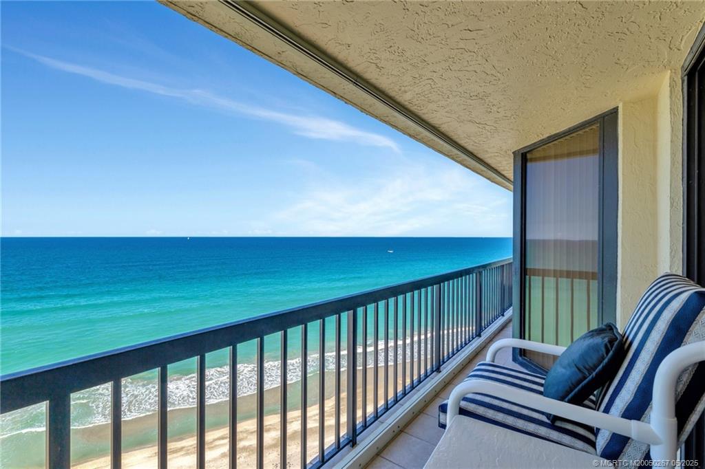 9500 South Ocean Drive, Unit HIGHER Jensen Beach, FL 34957 - Photo 44 of 53 a balcony with chairs