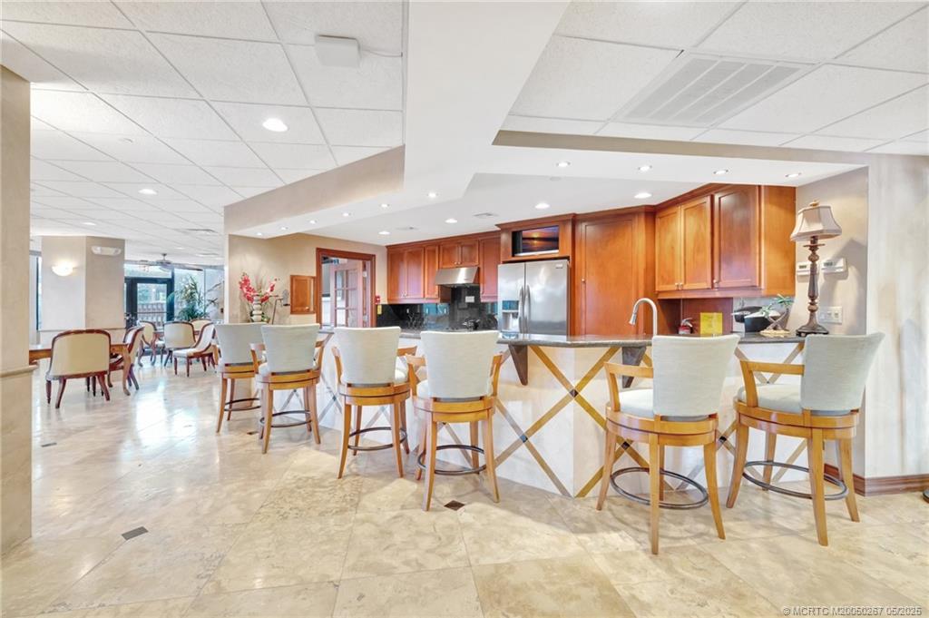 9500 South Ocean Drive, Unit HIGHER Jensen Beach, FL 34957 - Photo 53 of 53 a view of a dining room with furniture