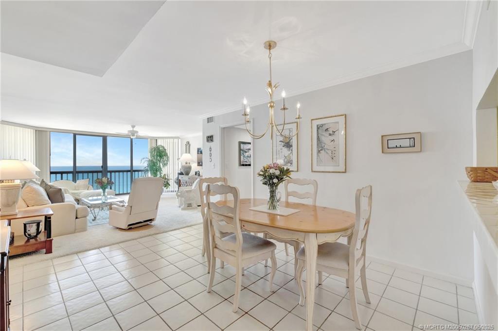 9500 South Ocean Drive, Unit HIGHER Jensen Beach, FL 34957 - Photo 6 of 53 a view of a dining room with furniture