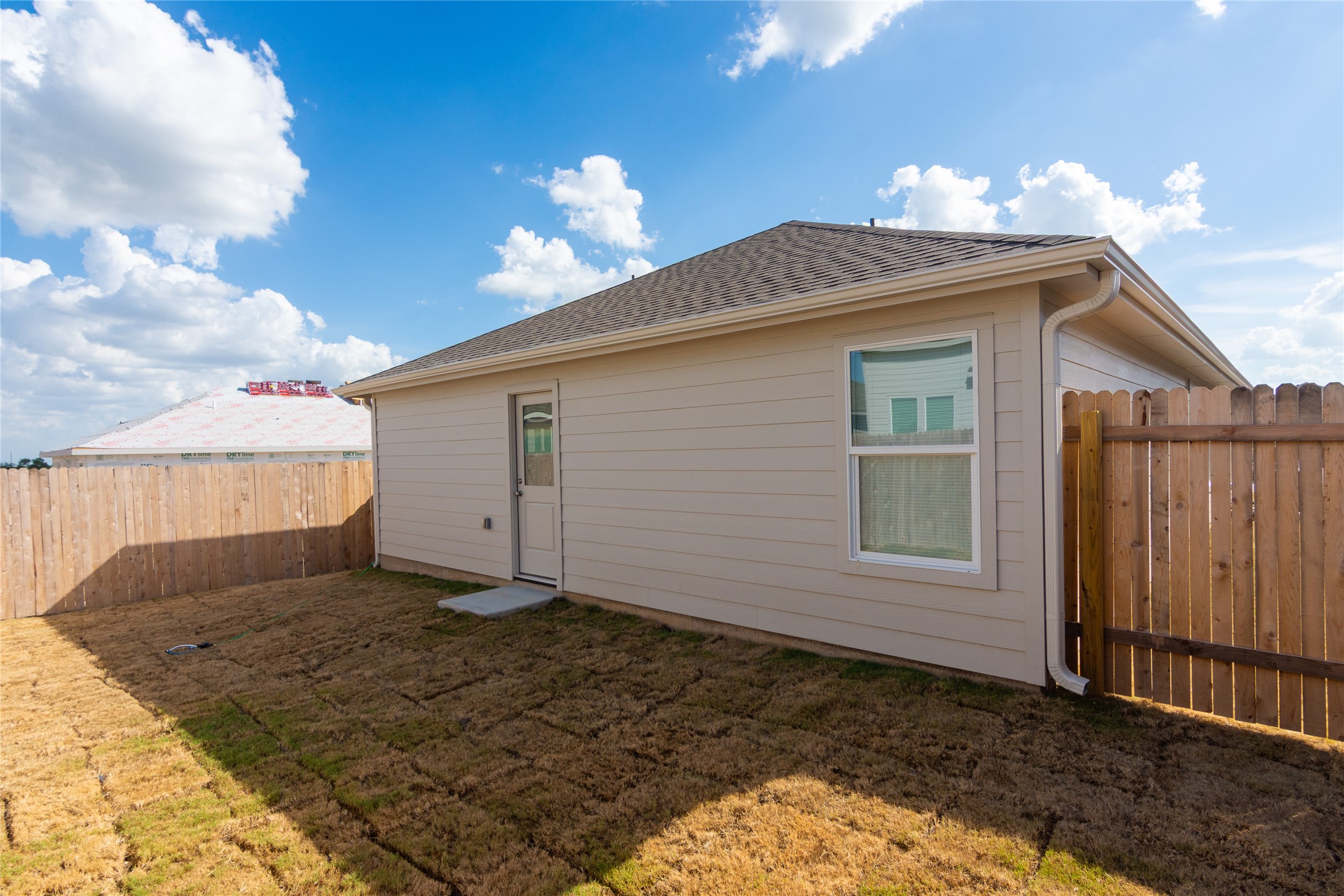 153 Star Packer Lane Jarrell, TX 76537 - Photo 23 of 30 A private, fenced backyard offers a blank canvas for outdoor enjoyment.