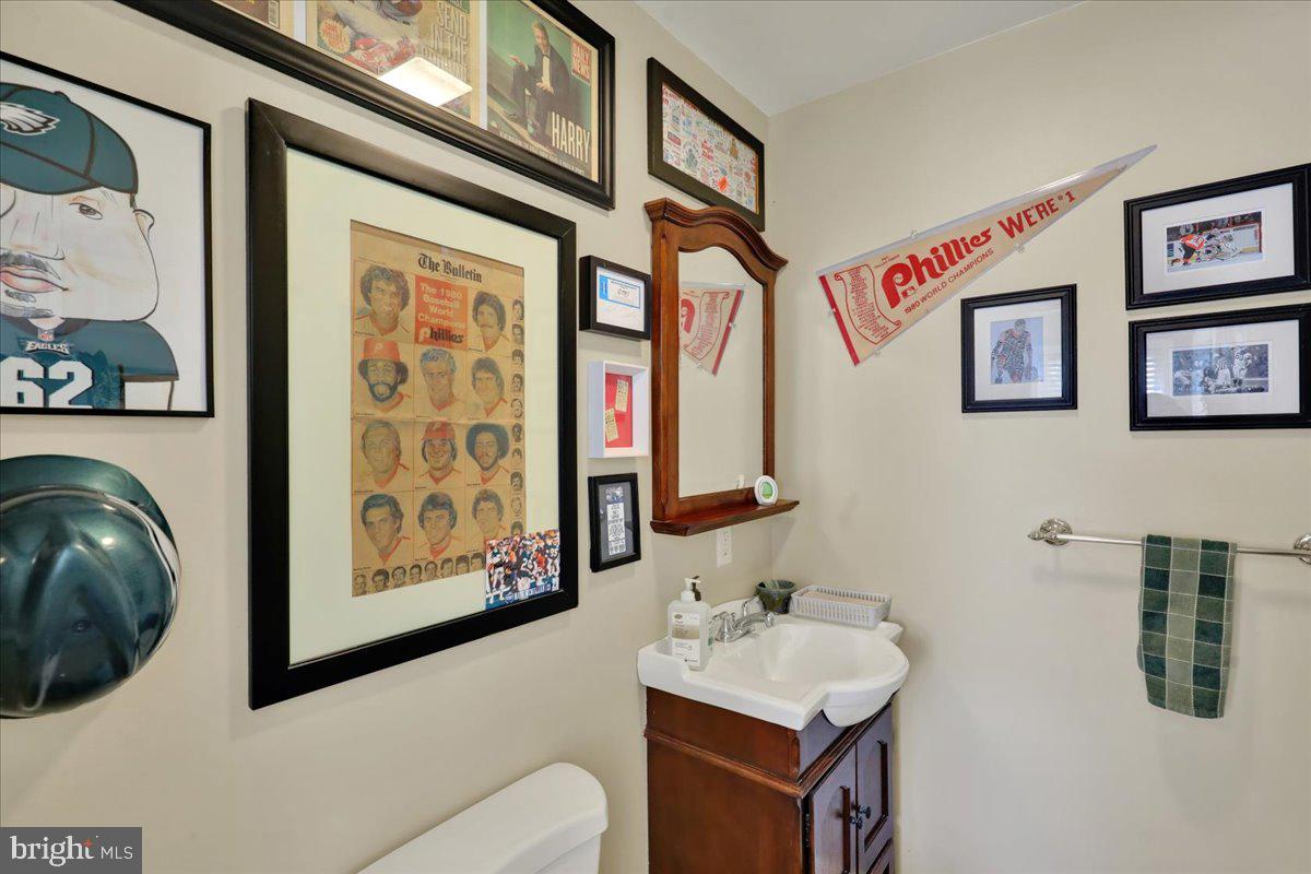 307 Summit Avenue Reading, PA 19607 - Photo 14 of 25 Vintage charm in a sports-themed bath.