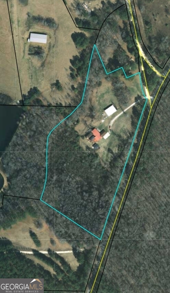 998 Campbell Road Meansville, GA 30256 - Photo 1 of 30 a bird view of a garden