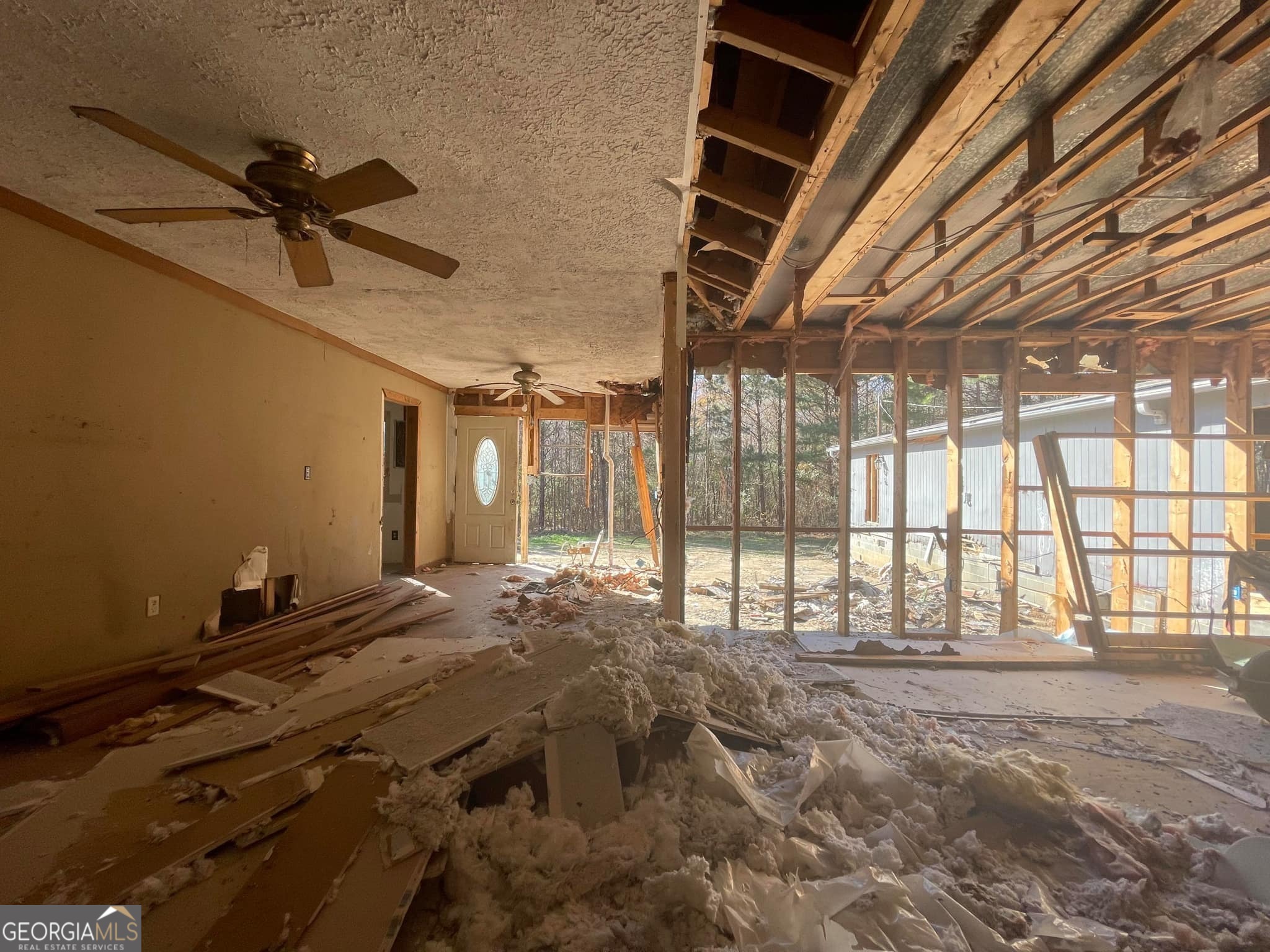 998 Campbell Road Meansville, GA 30256 - Photo 11 of 30 a view of an empty room with a window