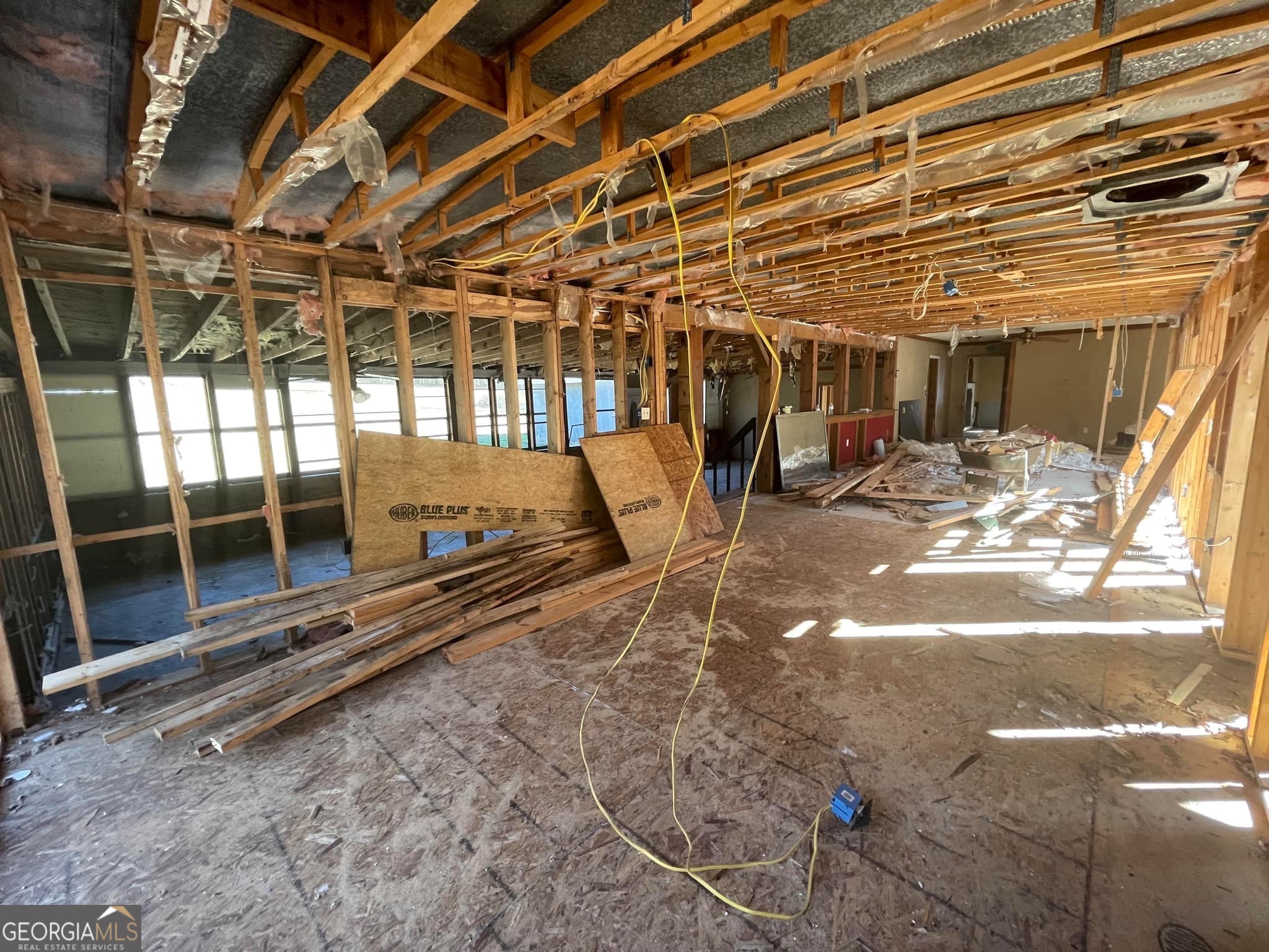 998 Campbell Road Meansville, GA 30256 - Photo 12 of 30 a view of a garage with wooden floor