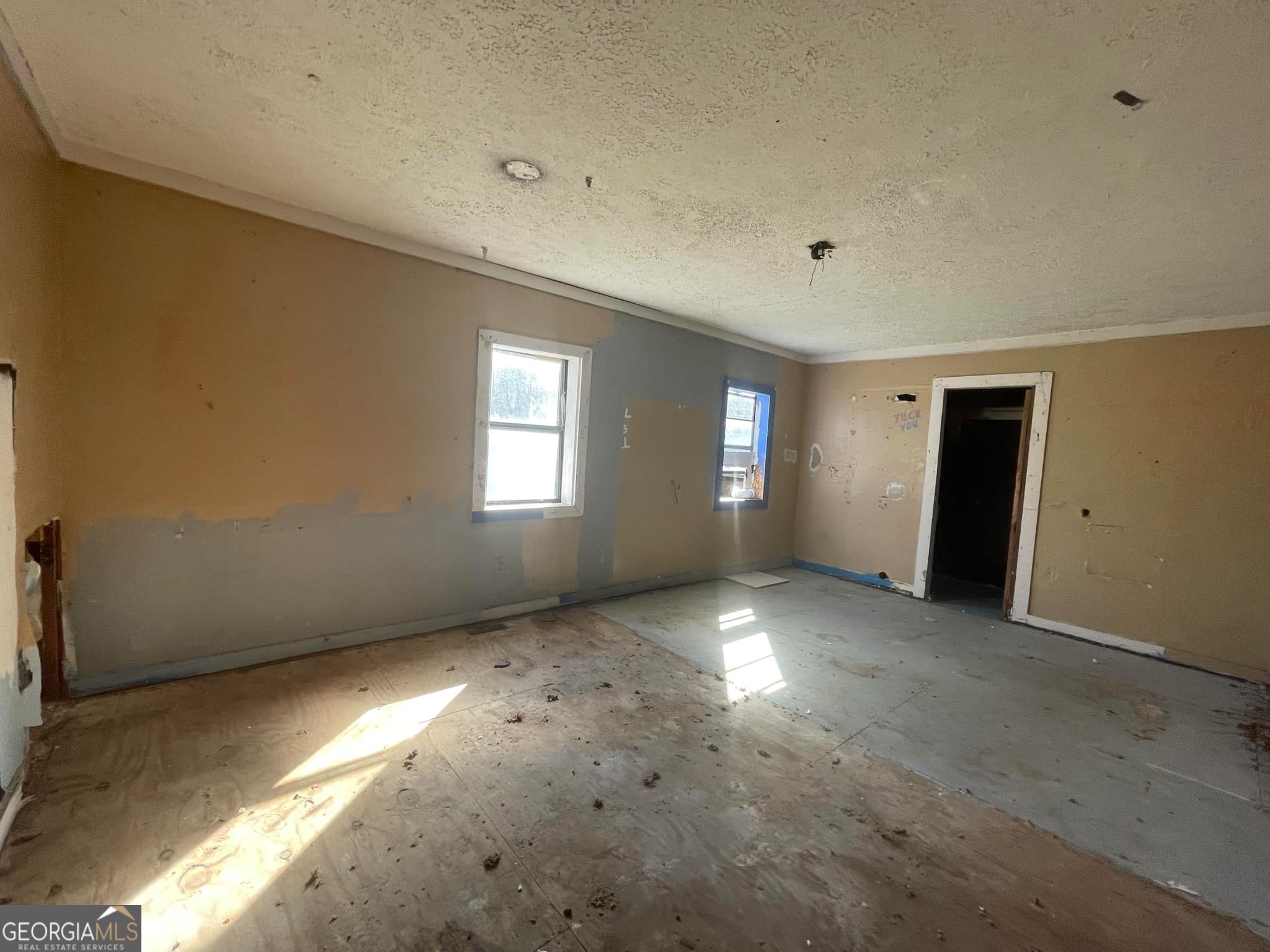 998 Campbell Road Meansville, GA 30256 - Photo 18 of 30 a view of an empty room with window