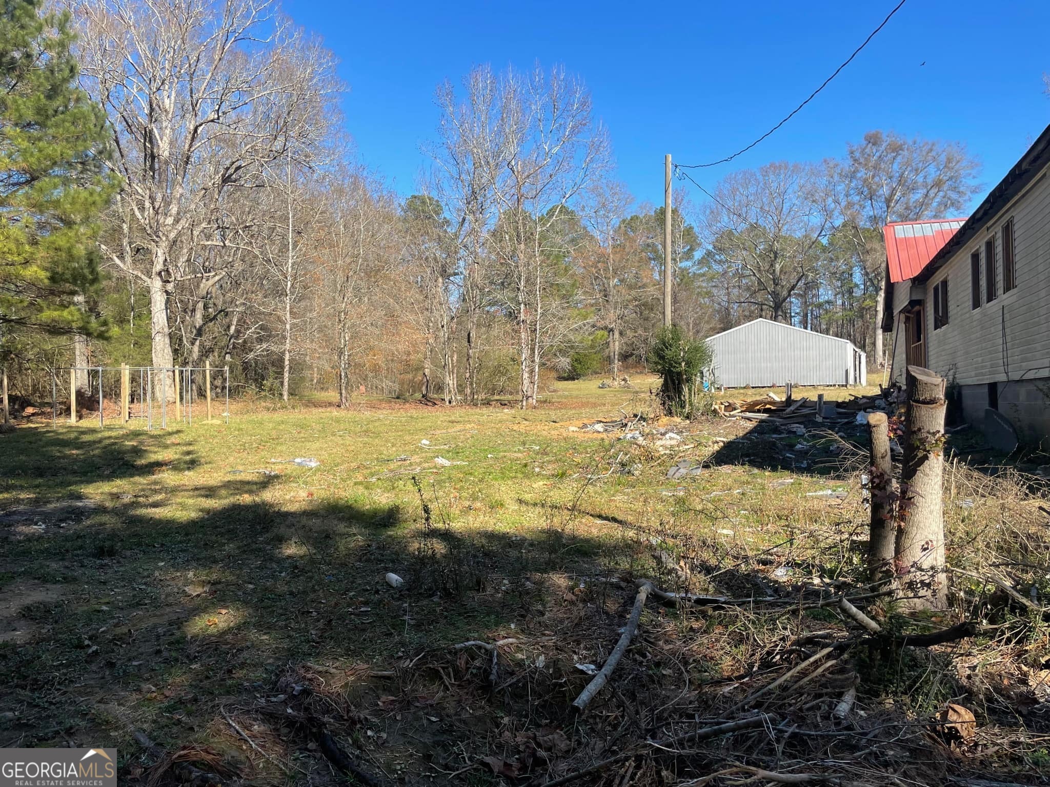 998 Campbell Road Meansville, GA 30256 - Photo 26 of 30 a view of a yard with an house