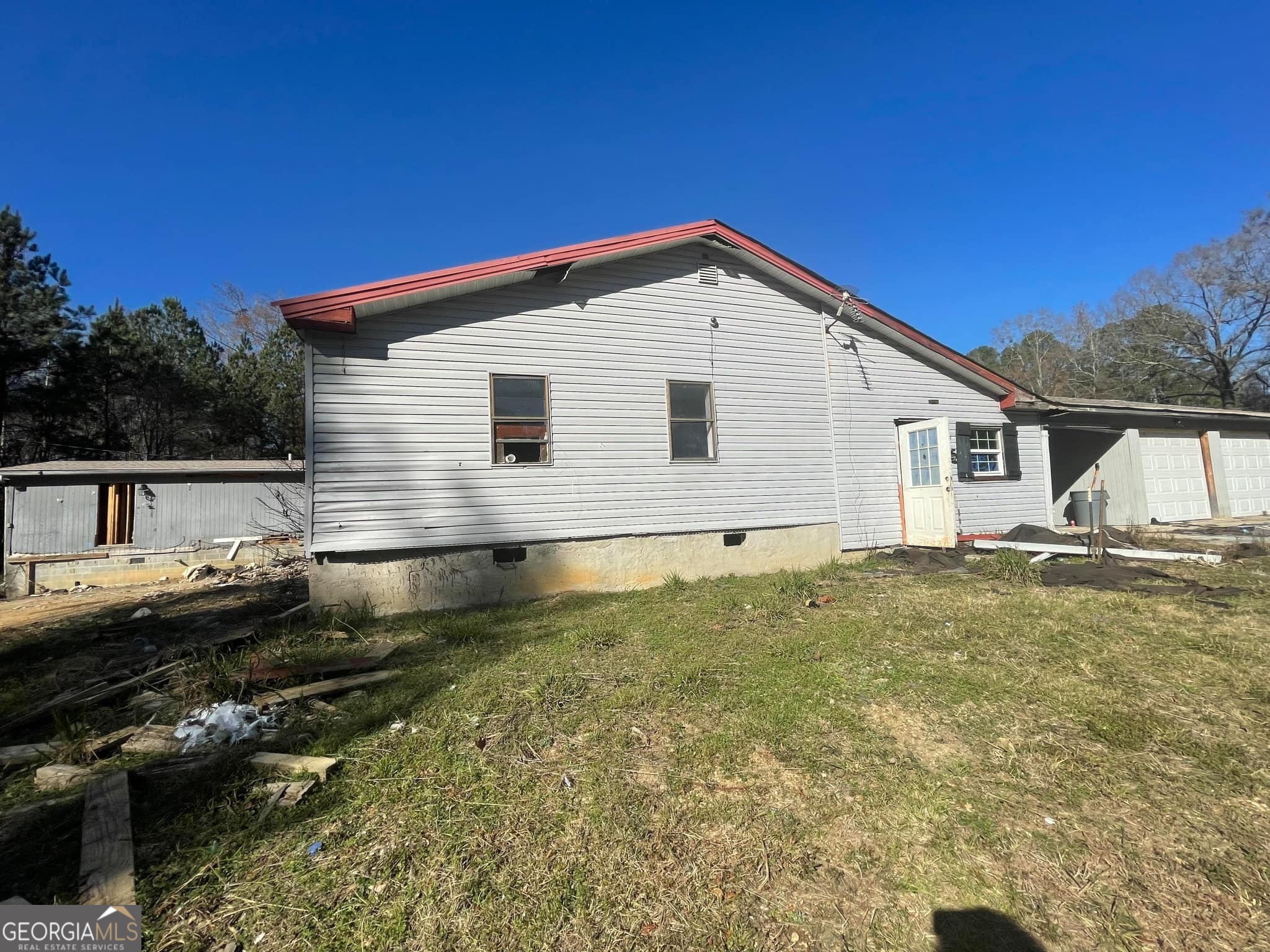 998 Campbell Road Meansville, GA 30256 - Photo 5 of 30 a view of backyard of house