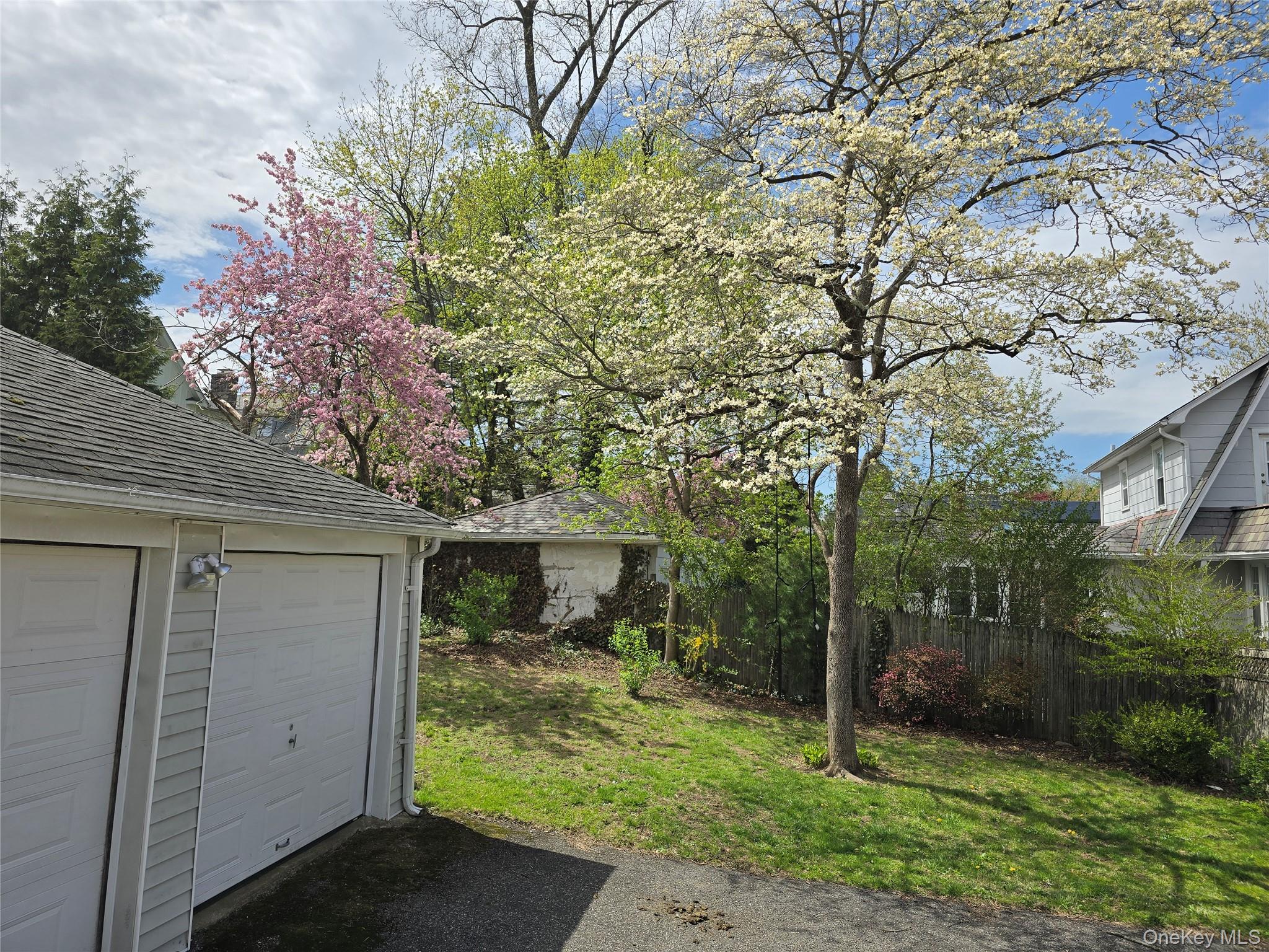 15 Roosevelt Avenue Rye, NY 10580 - Photo 12 of 13 front view of a house with a yard