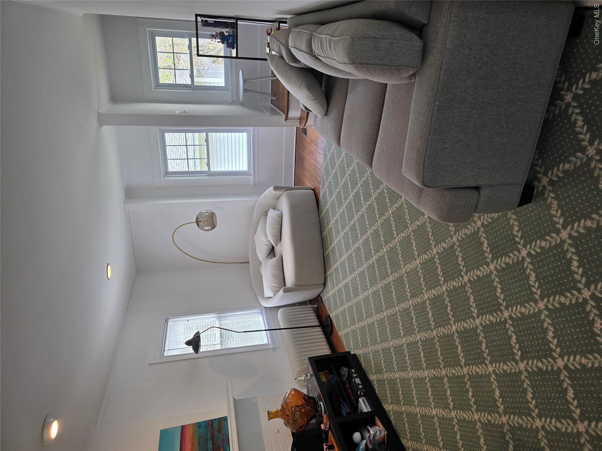15 Roosevelt Avenue Rye, NY 10580 - Photo 2 of 13 a bedroom with furniture and a window