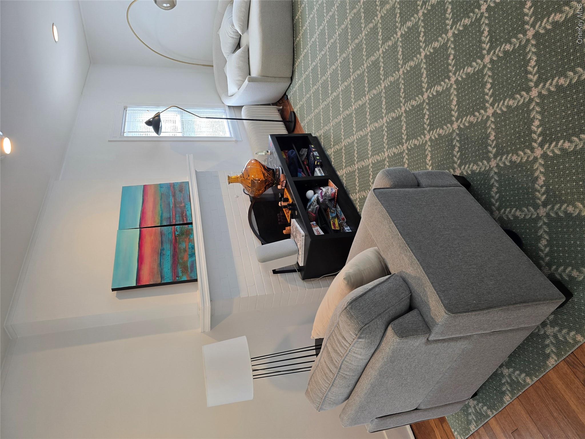 15 Roosevelt Avenue Rye, NY 10580 - Photo 3 of 13 a living room with furniture and a rug